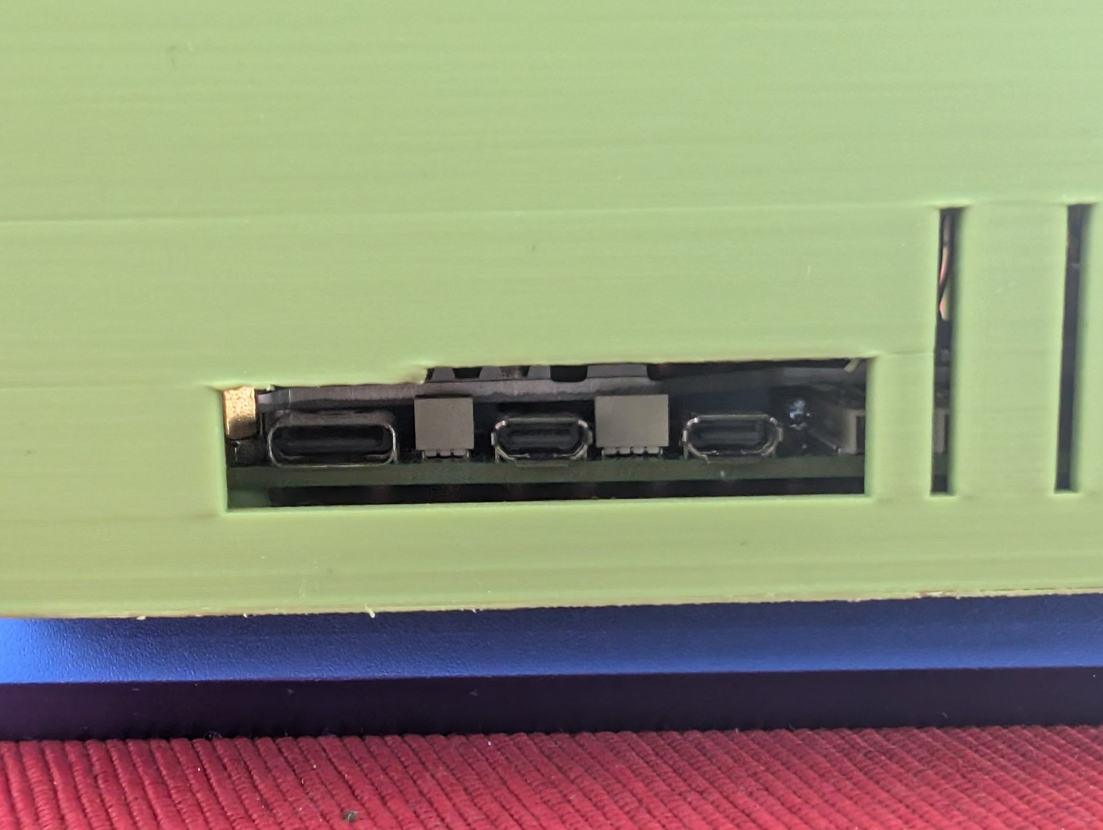 Close-up of HDMI and USB-C port cutouts